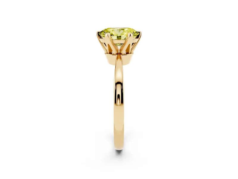 Fancy Yellow Oval Cut Diamond Solitaire Engagement Ring Set in Yellow gold with Slim Tapered Solitaire Band