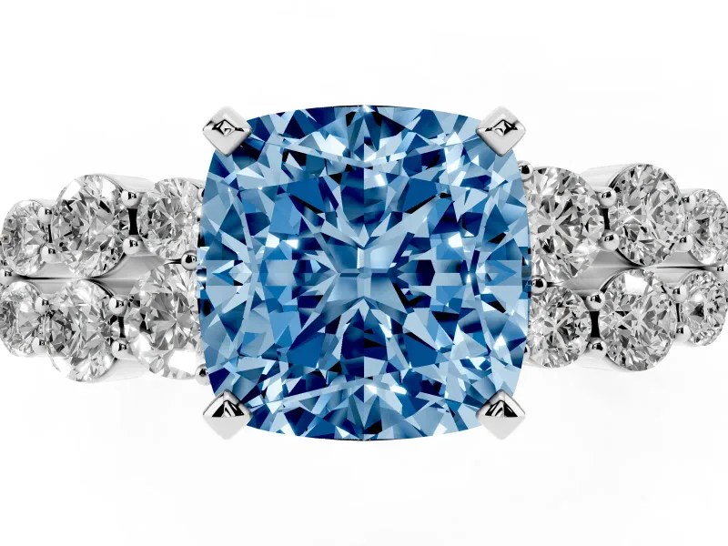 Fancy Blue Cushion Cut Diamond Cluster Engagement Ring Set in Platinum with Pavé Band and Prong Setting