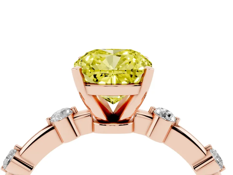 Fancy Yellow Cushion Cut Diamond Solitaire Ring Set in Rose gold with Bezel Set Side Stones and Prong Setting