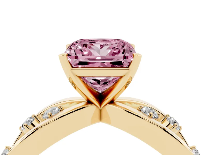 Fancy Pink Princess Cut Diamond Solitaire Ring Set in Yellow gold with Side Stones on Criss-Cross Band and Prong Setting