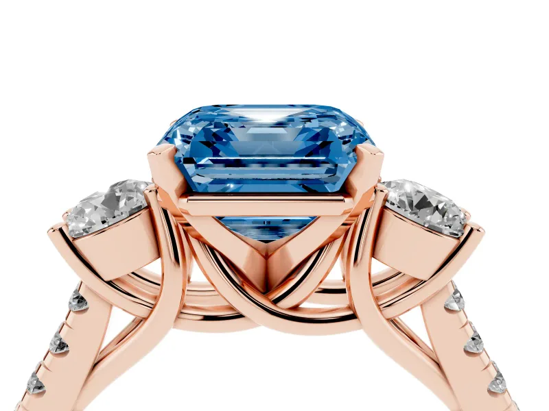 Fancy Blue Three-Stone Asscher Cut Diamond Pavé Band Ring Set in Rose gold with Prong-Set Trio