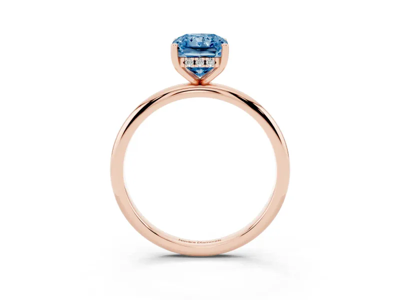 Fancy Blue Radiant Cut Diamond Solitaire Engagement Ring Set in Rose gold with Prong Setting and Polished Band