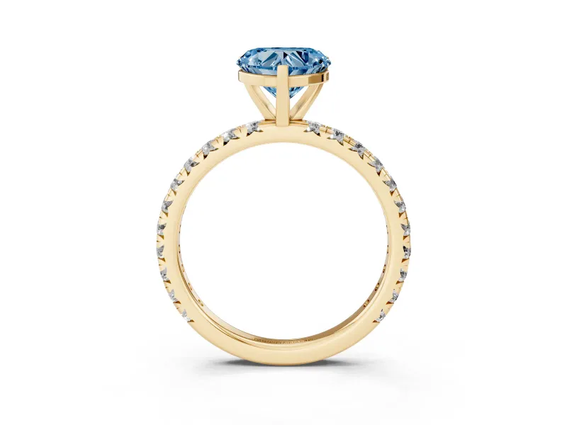 Fancy Blue Heart Cut Diamond Pavé Solitaire Ring Set in Yellow gold with Round Band and Prong Setting