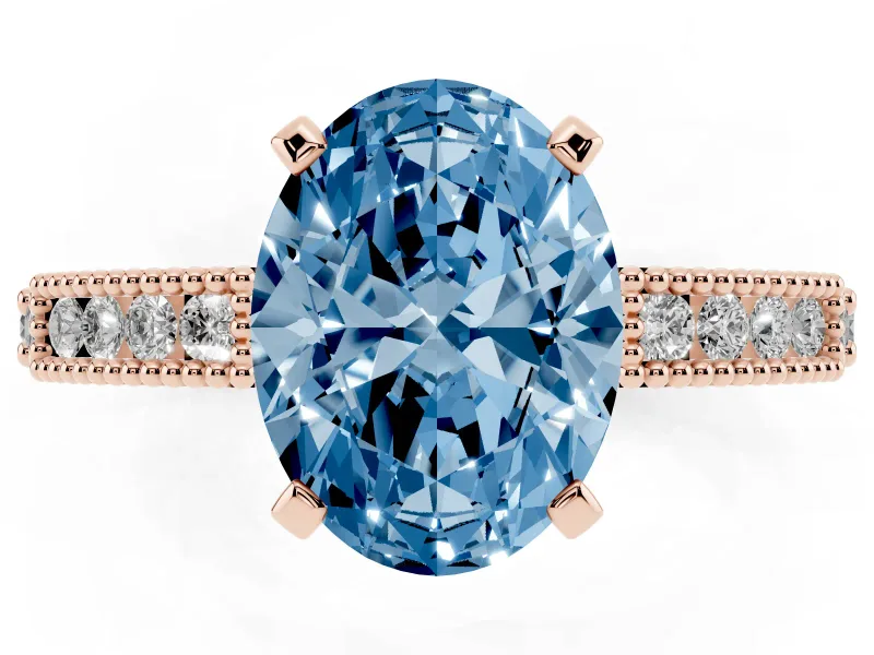 Fancy Blue Oval Cut Diamond Solitaire Ring Set in Rose gold with Slim Pavé Band and Prong Setting