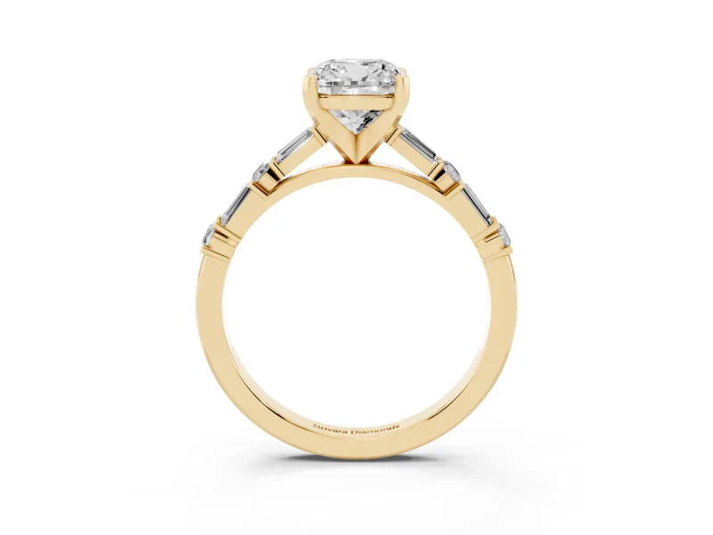 Cushion Cut Diamond Solitaire Set in Yellow gold with Side Baguettes and Channel Set Band