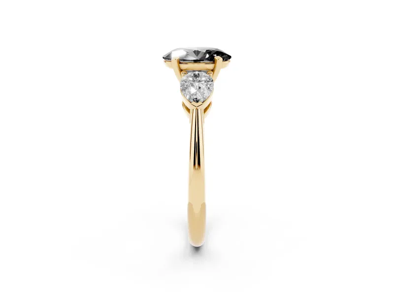 Oval Three-Stone Engagement Ring Setting for a Black Center | Pear Side Stones | Yellow Gold