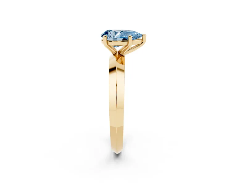Fancy Blue Pear Cut Diamond Solitaire Engagement Ring Set in Yellow gold with Flat Band and Prong Setting