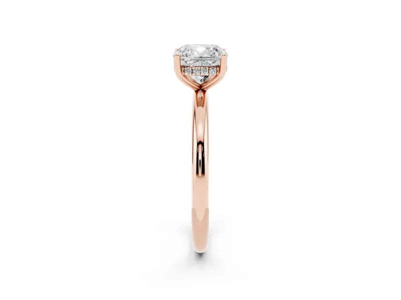 Cushion Cut Diamond Solitaire Engagement Ring Set in Rose gold with Prong Setting and Polished Band