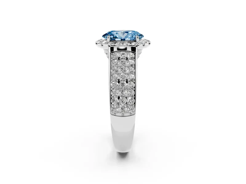 Fancy Blue Oval Cut Diamond Halo Ring Set in Silver with Pavé Band and Raised Center Setting