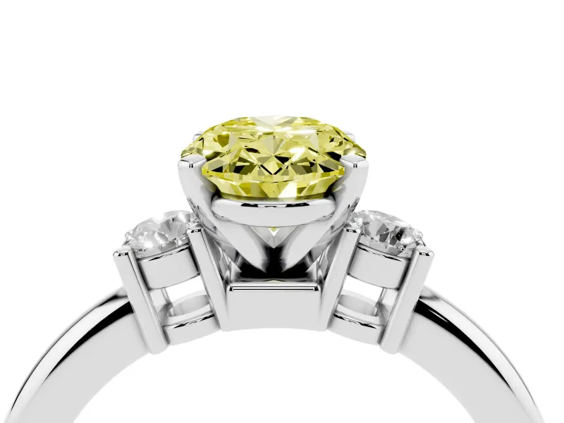 Fancy Yellow Three-Stone Oval Cut Diamond Ring Set in Platinum with Prong Setting and Plain Band