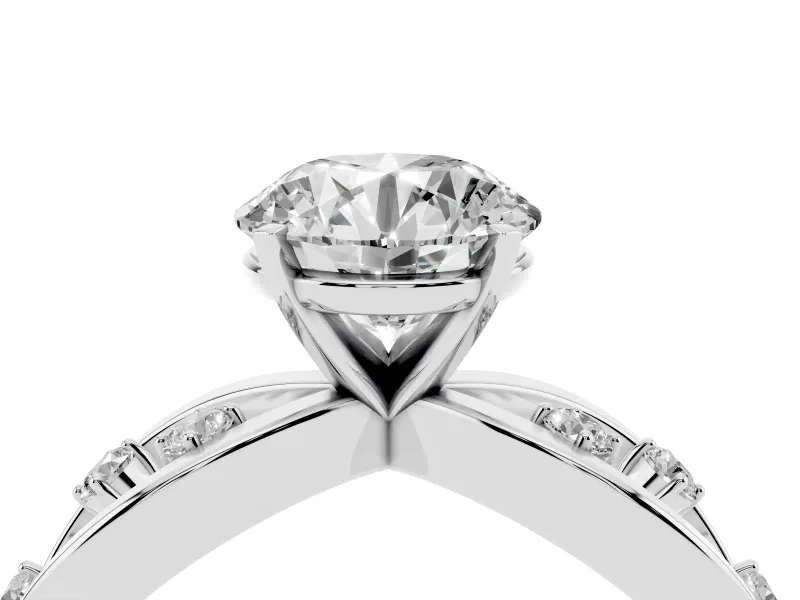 Round Cut Diamond Solitaire Ring Set in White gold with Side Stones on Criss-Cross Band and Prong Setting