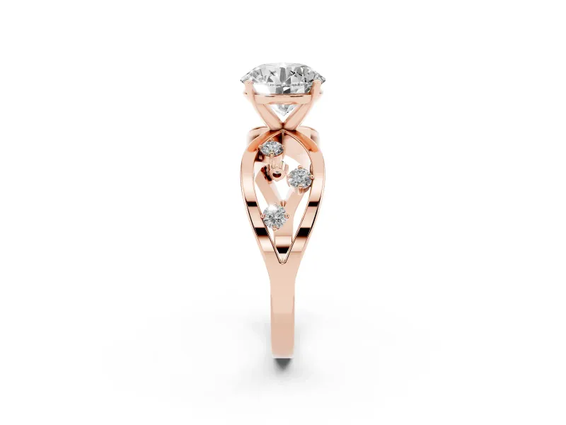 Round Cut Diamond Solitaire Ring Set in Rose gold with Side Stones on Criss-Cross Band and Prong Setting