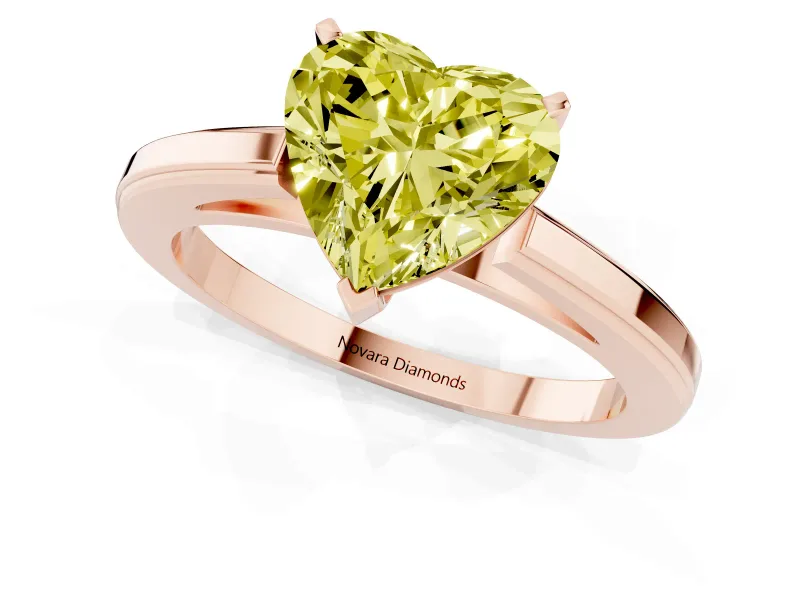 Fancy Yellow Heart Cut Diamond Solitaire Ring Set in Rose gold with Prong Setting and Classic Band