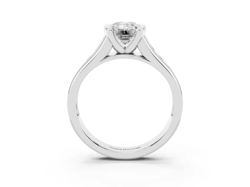 Emerald Cut Diamond Bezel-Set Solitaire Ring Set in White gold with Channel-Set Band