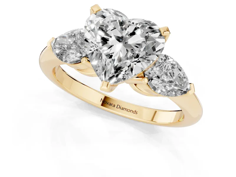 Heart-Shaped Three-Stone Engagement Ring Setting | Pear Side Stones | Yellow Gold