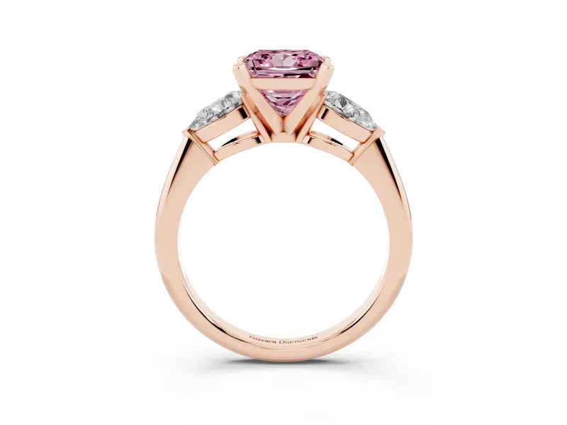 Fancy Pink Three-Stone Princess Cut Diamond Ring Set in Rose gold with Pear Side Stones and Prong Setting