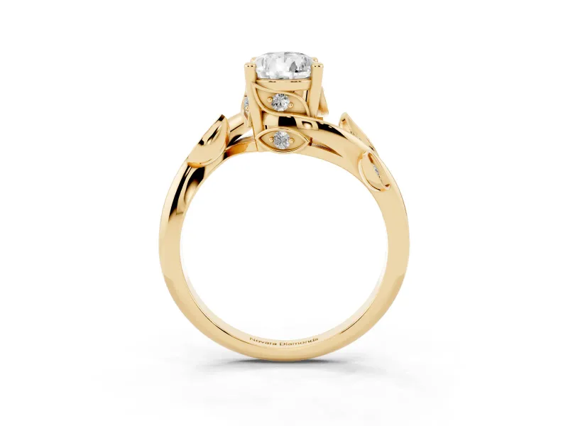 Pear Cut Diamond Solitaire Twist Engagement Ring Set in Yellow gold with Pavé Leaf Accents
