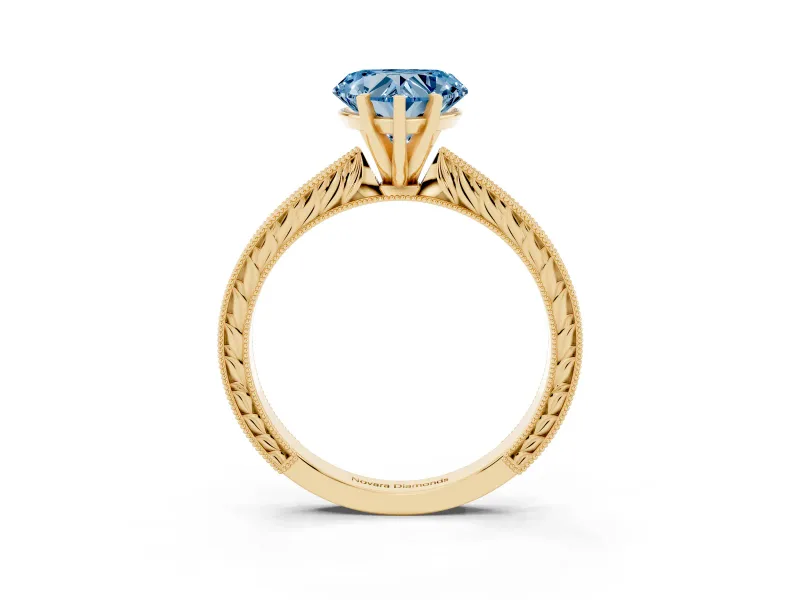Fancy Blue Heart Cut Diamond Solitaire Milgrain Engraved Band Set in Yellow gold with Prong Setting