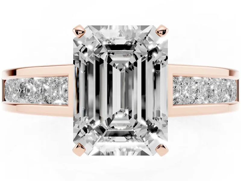 Emerald Cut Diamond Solitaire Ring Set in Rose gold with Channel-Set Band and Prong Setting
