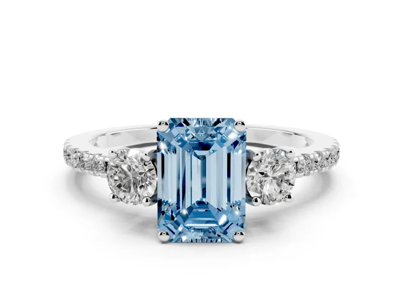 Fancy Blue Emerald Cut Diamond Three-Stone Ring Set in Platinum with Pavé Band and Graduated Sides
