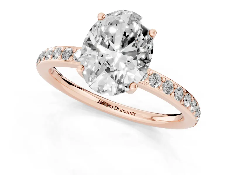 Oval Cut Diamond Pavé Band Ring Set in Rose gold with Prong-Set Center Stone