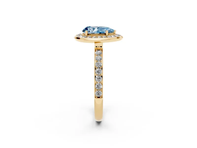 Fancy Blue Pear Cut Diamond Halo Ring Set in Yellow gold with Bezel Frame and Pavé Band