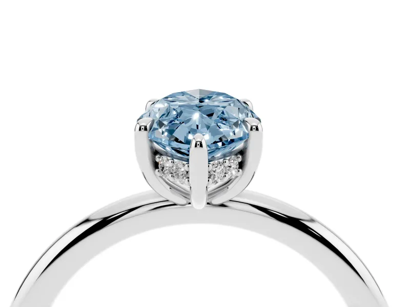 Fancy Blue Marquise Cut Diamond Solitaire Ring Set in Silver with Thin Band and Prong Setting