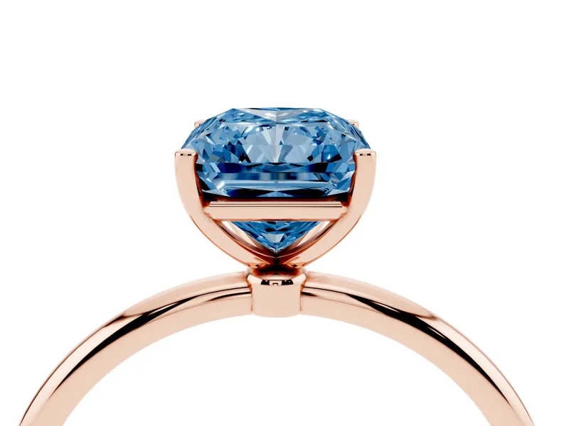 Fancy Blue Radiant Cut Diamond Solitaire Engagement Ring Set in Rose gold with Thin Band and Prong Setting