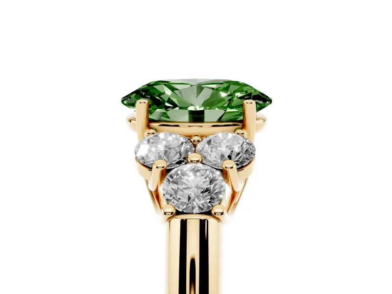 Fancy Green Oval Cut Diamond Cluster Ring Set in Yellow gold with Round Accent Stones and Prong Setting on a Plain Band