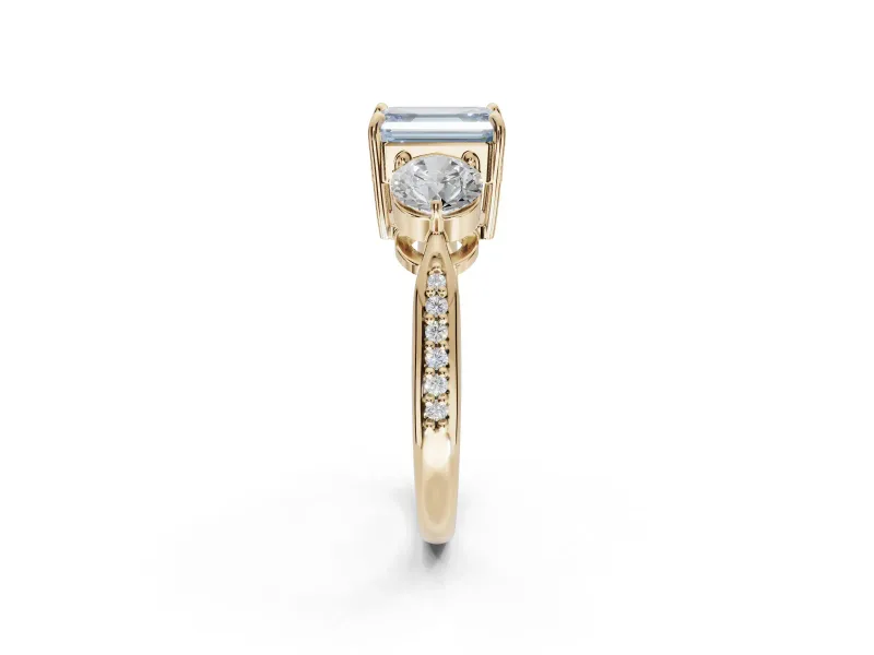 Emerald Cut Three Stone Engagement Ring Setting for a Fancy Blue Lab-Grown Diamond | Tapered Pave Band | Yellow Gold