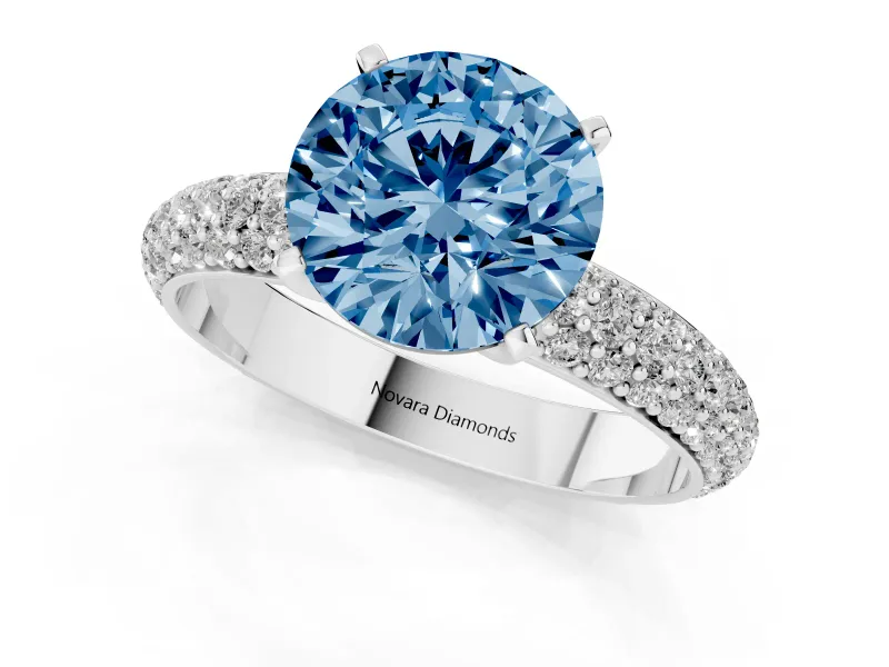 Fancy Blue Round Cut Diamond Solitaire Ring Set in Silver with Prong Setting and Pavé-Set Band