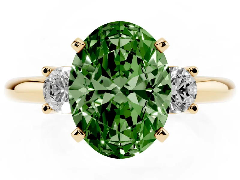 Fancy Green Three-Stone Oval Cut Diamond Ring Set in Yellow gold with Prong Setting and Plain Band