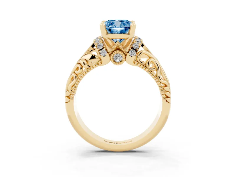 Fancy Blue Cushion Cut Diamond Filigree Halo Engagement Ring Set in Yellow gold with Prong Setting