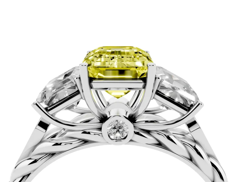 Fancy Yellow Emerald Cut Diamond Three-Stone Ring Set in White gold with Braided Band