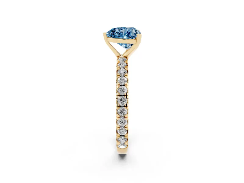 Fancy Blue Heart Cut Diamond Pavé Solitaire Ring Set in Yellow gold with Round Band and Prong Setting