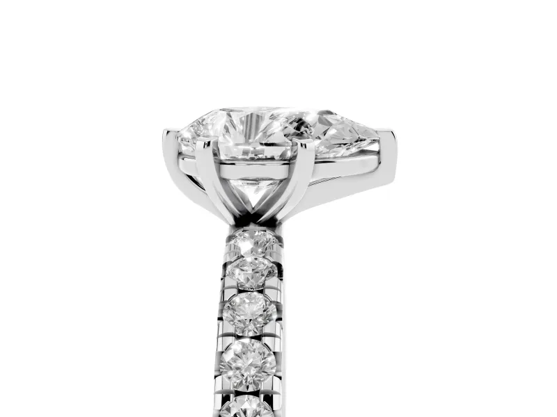 Pear Cut Diamond Pavé Solitaire Ring Set in White gold with Round Band and Prong Setting