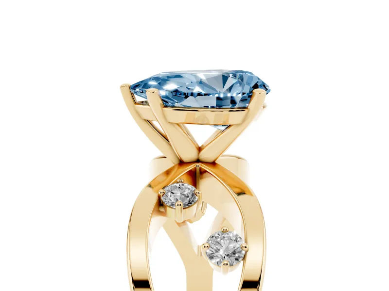 Fancy Blue Pear Cut Diamond Solitaire Ring Set in Yellow gold with Side Stones on Criss-Cross Band and Prong Setting
