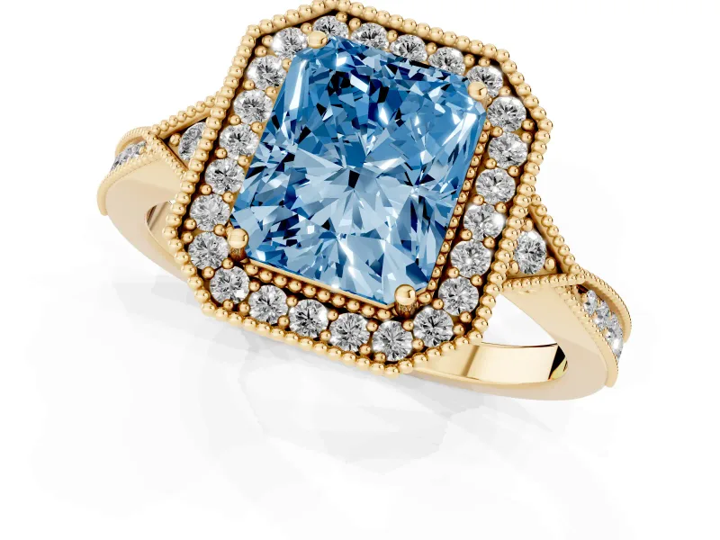 Fancy Blue Radiant Cut Diamond Halo Engagement Ring Set in Yellow gold with Milgrain Pavé Band