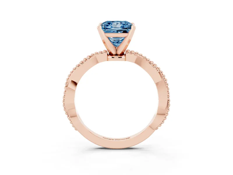 Fancy Blue Princess Cut Diamond Solitaire Ring Set in Rose gold with Twisted Band and Bead Prong Setting