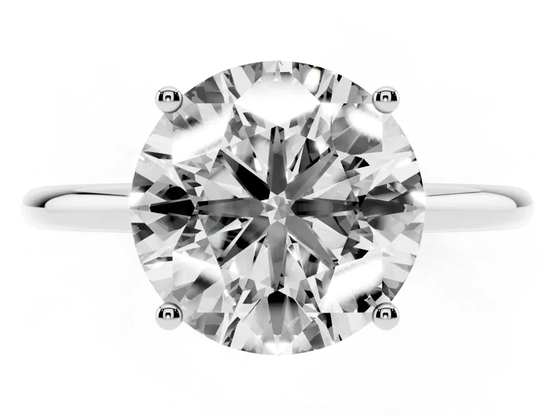 Round Cut Diamond Solitaire Engagement Ring Set in White gold with Thin Band and Prong Setting