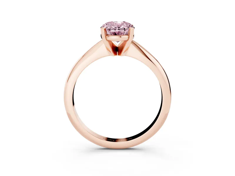 Fancy Pink Oval Cut Diamond Solitaire Ring Set in Rose gold with Prong Setting on a Plain Round Band