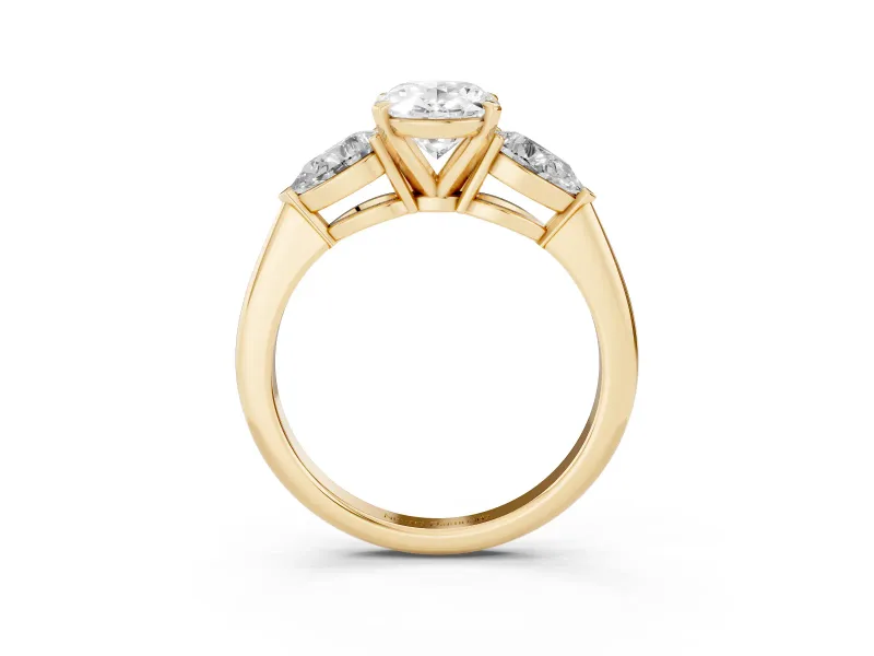 Three-Stone Oval Cut Diamond Ring Set in Yellow gold with Pear Side Stones and Prong Setting