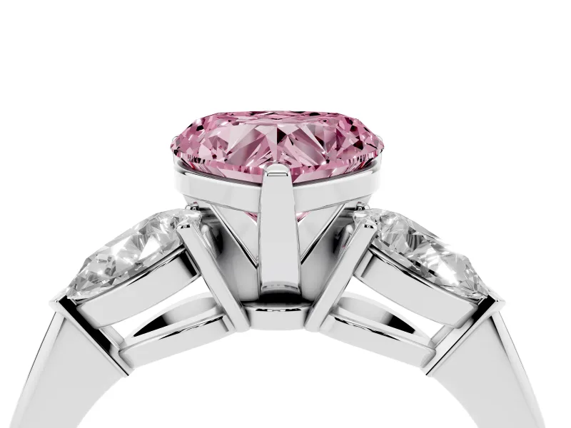 Fancy Pink Three-Stone Heart Cut Diamond Ring Set in Platinum with Pear Side Stones and Prong Setting