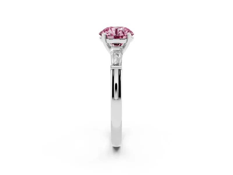 Fancy Pink Round Cut Diamond Solitaire Ring Set in Silver with Tapered Baguette Side Stones and Prong Setting