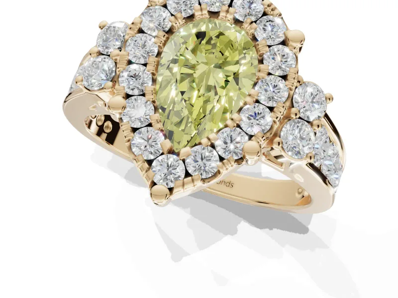 Pear-Shaped Halo Engagement Ring Setting for a Fancy Yellow Lab-Grown Diamond | Graduated Channel Band | Yellow Gold
