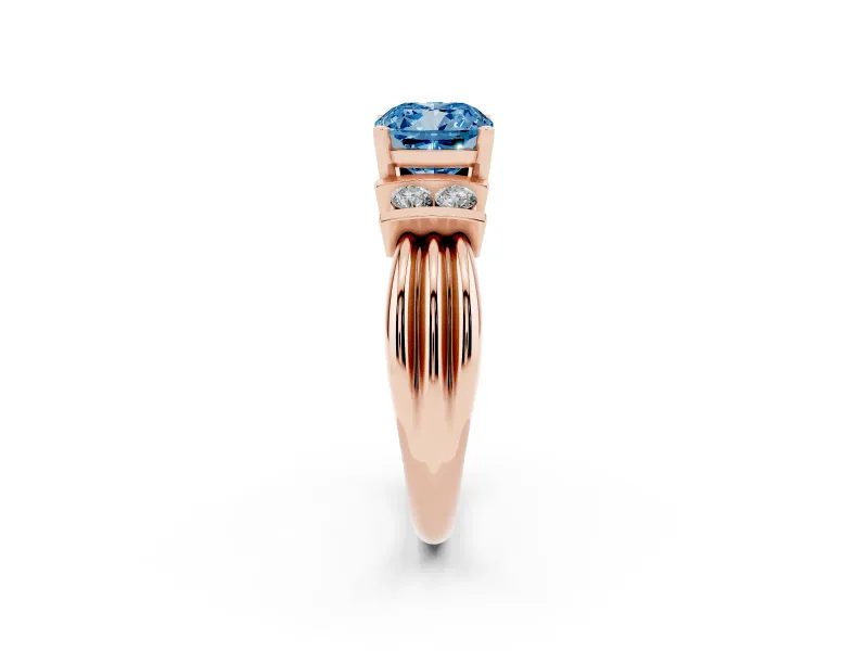 Fancy Blue Three-Stone Cushion Cut Diamond Channel Set Ring Set in Rose gold with Bar Prongs
