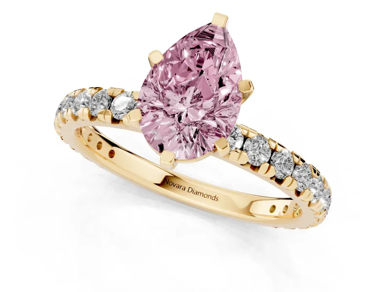 Fancy Pink Pear Cut Diamond Pavé Solitaire Ring Set in Yellow gold with Round Band and Prong Setting