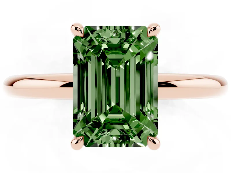 Fancy Green Emerald Cut Diamond Solitaire Ring Set in Rose gold with Thin Band and Prong Setting