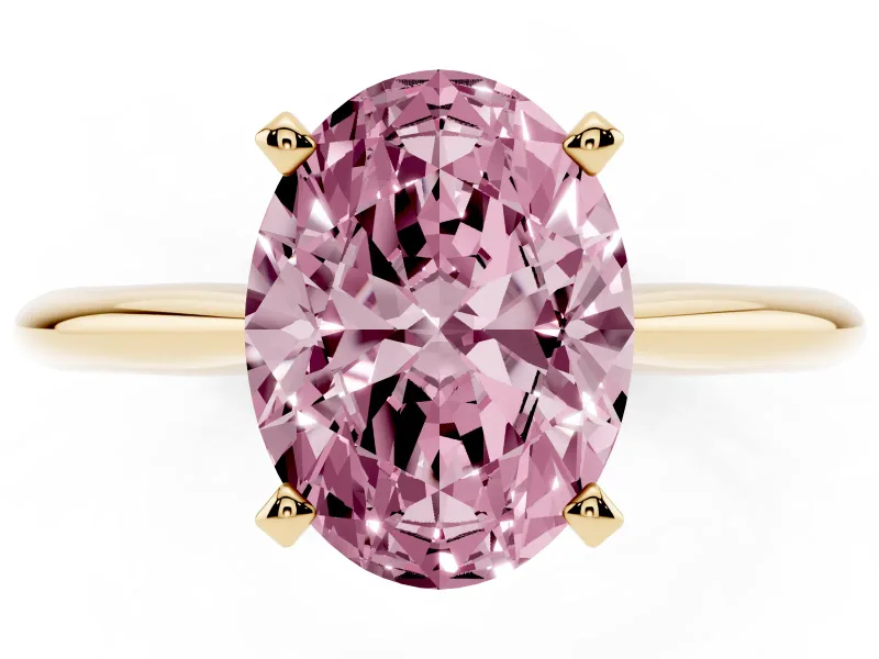 Fancy Pink Oval Cut Diamond Solitaire Ring Set in Yellow gold with Prong Setting on a Plain Round Band