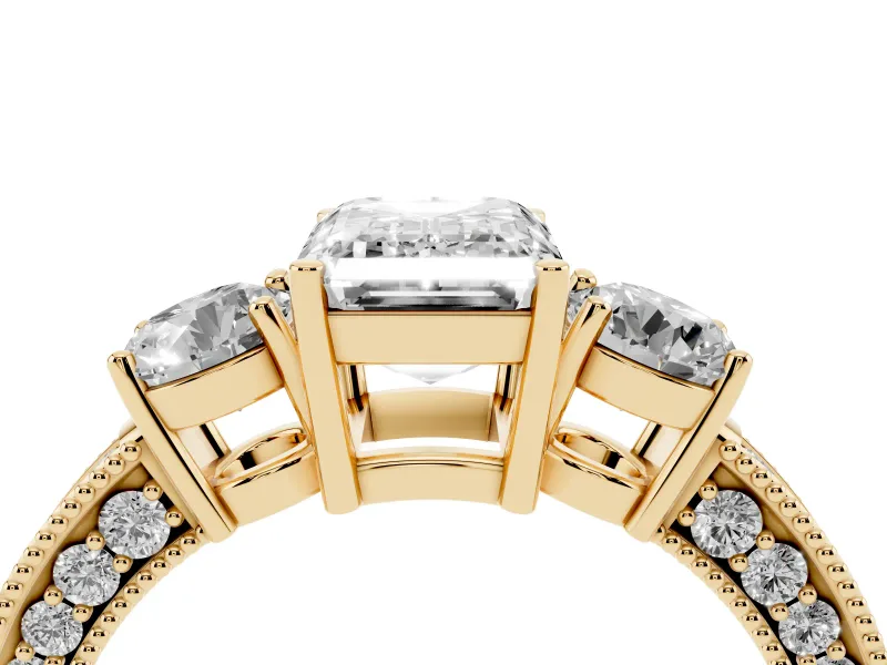 Emerald Cut Diamond Three-Stone Ring Set in Yellow gold with Round Side Stones and Pavé Band